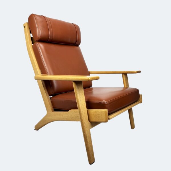 Hans J Wegner GE290 high back chair in brown leather and solid oak